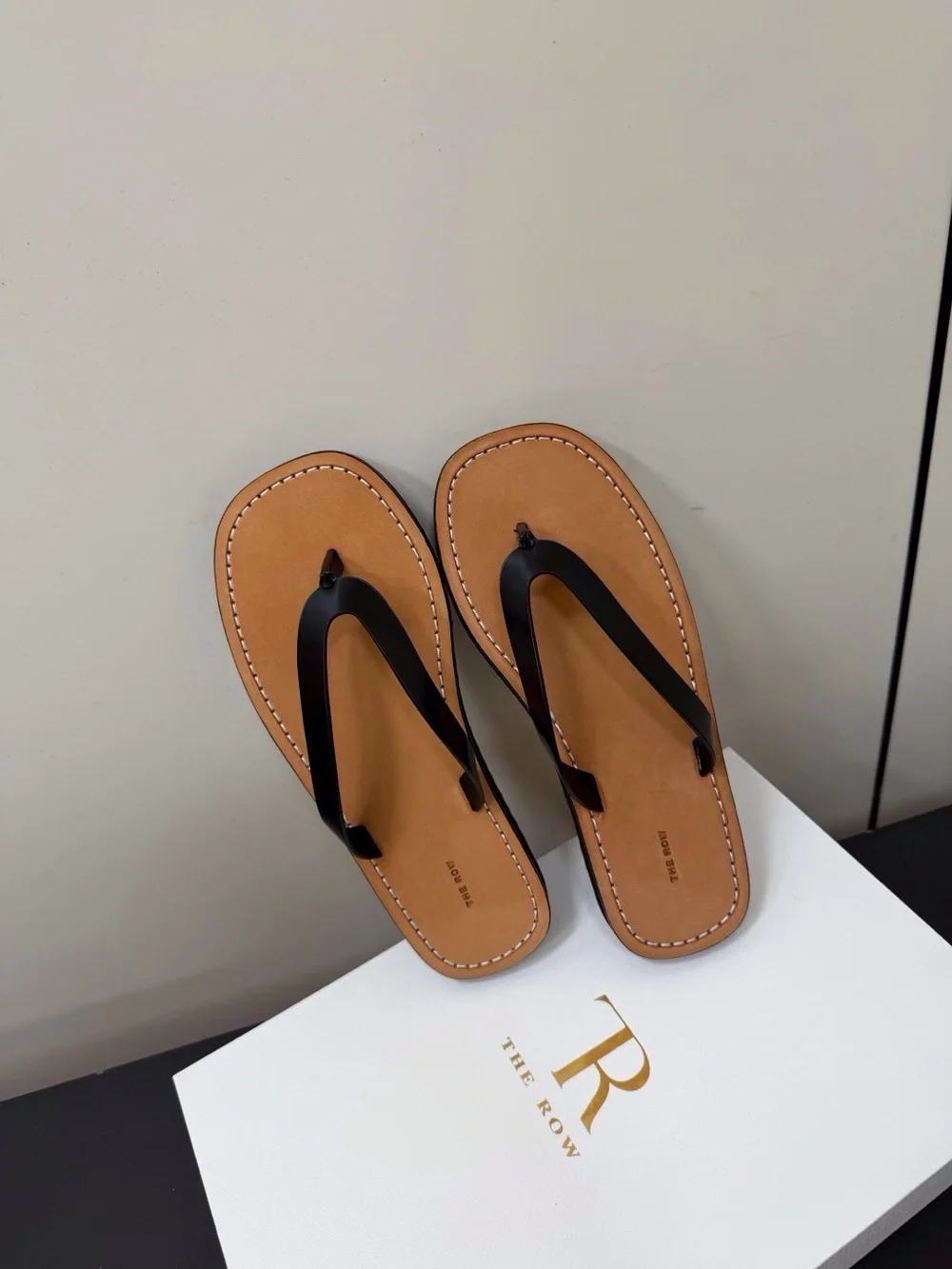 Women’s Tan Leather Flip-Flop Sandals with Black Straps